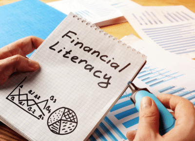 Notepad with Financial Literacy written on paper