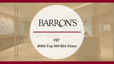 A circular banner reads BARRONS #27 2024 Top 100 RIA Firms over a blurred image of a modern office lobby with glass doors, wooden floors, and a wall with the letters HB.